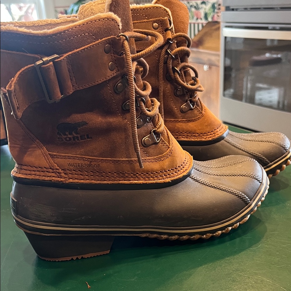 Sorel Tan and Black Winter Boots